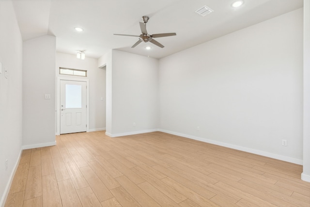 spare room featuring visible vents, baseboards, ceiling fan, light wood-style floors, and recessed lighting