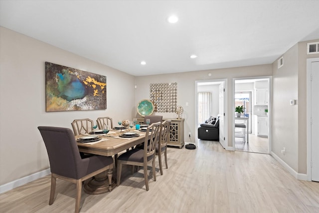 dining area featuring visible vents, recessed lighting, light wood-style flooring, and baseboards