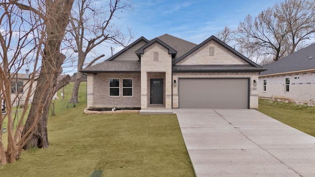 view of front of property featuring a garage, brick siding, a front yard, and a shingled roof