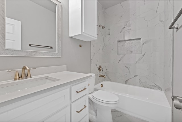 bathroom with marble finish floor, tub / shower combination, vanity, and toilet