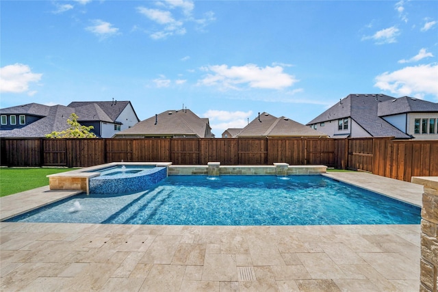 view of swimming pool featuring a residential view, a fenced backyard, and a pool with connected hot tub