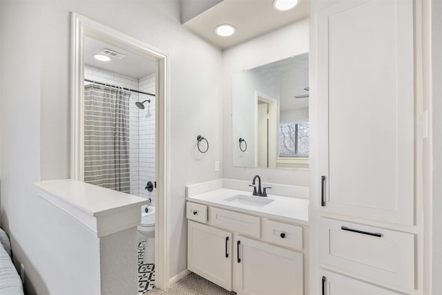 full bath featuring shower / tub combo, visible vents, vanity, and toilet