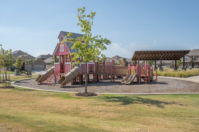 community jungle gym with a lawn