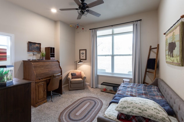 living area with carpet floors, recessed lighting, a ceiling fan, and baseboards