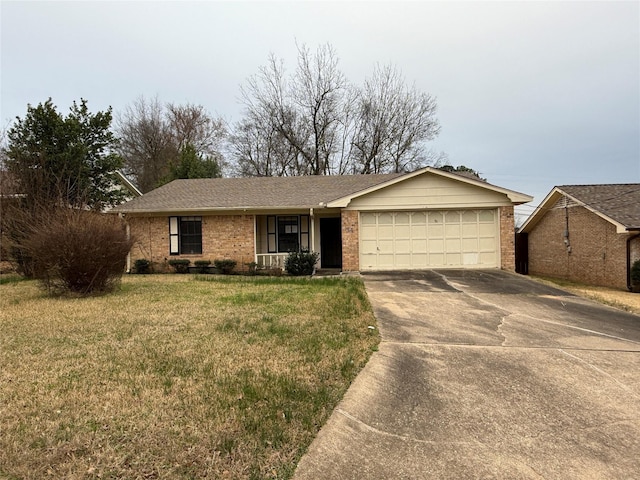 ranch-style house with driveway, a garage, a front lawn, and brick siding