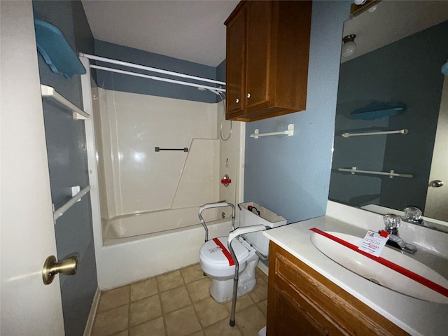 bathroom with toilet, washtub / shower combination, and vanity