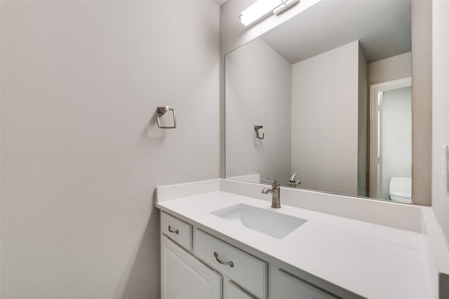 half bath with toilet and vanity