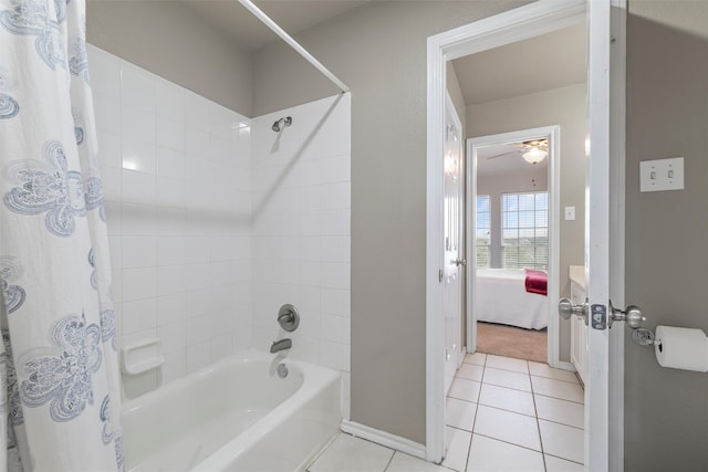 full bathroom featuring shower / tub combo, tile patterned flooring, and baseboards