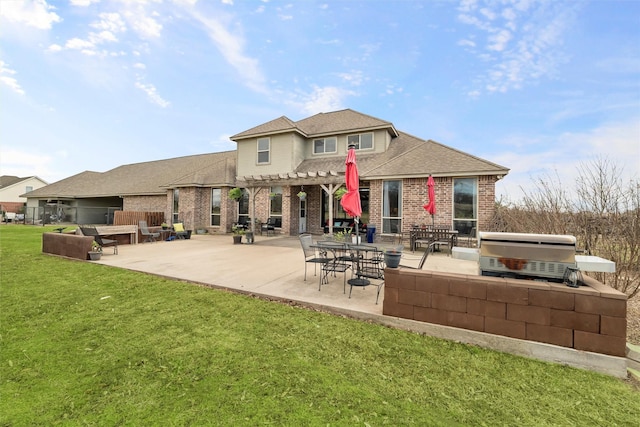 rear view of house with area for grilling, a yard, a patio area, a pergola, and brick siding