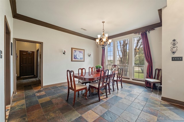 dining area with visible vents, stone tile flooring, and baseboards