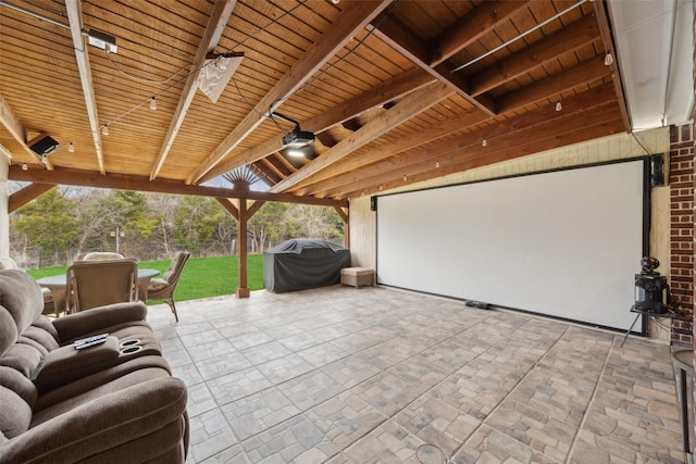 view of patio / terrace featuring a grill and fence