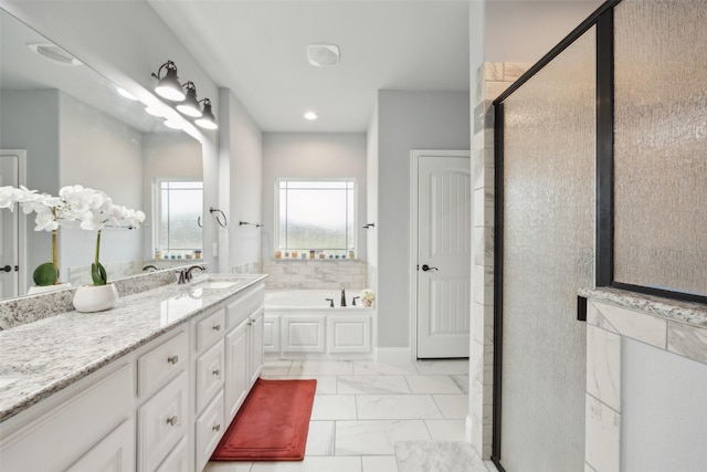 full bathroom with a garden tub, a shower stall, marble finish floor, and vanity