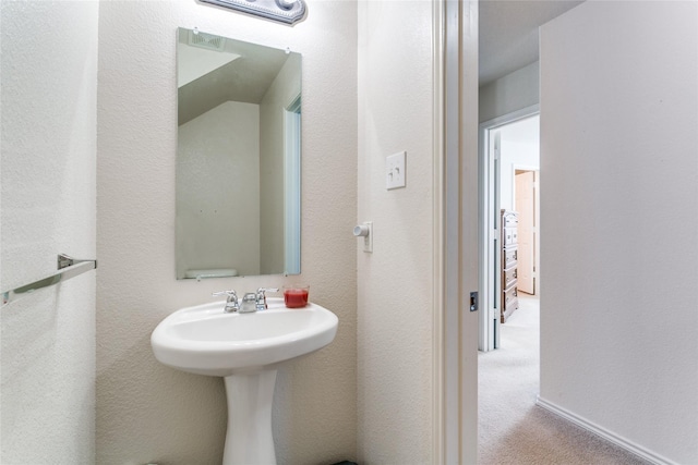 bathroom with baseboards