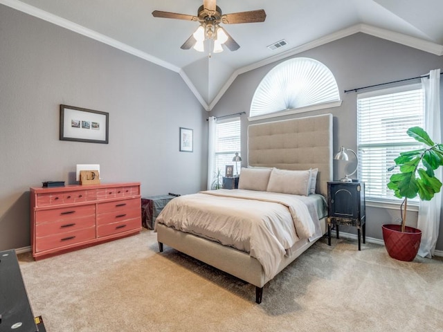 bedroom featuring lofted ceiling, visible vents, and carpet