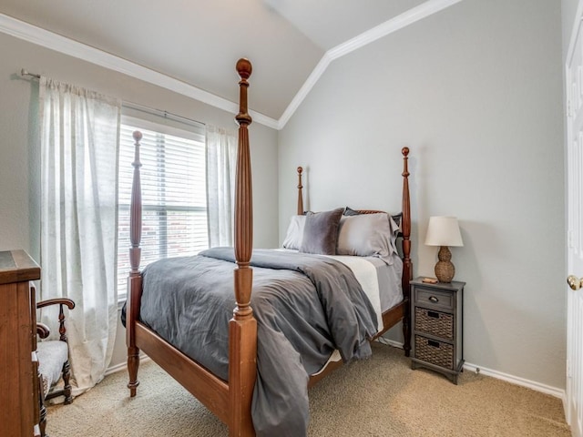 carpeted bedroom with vaulted ceiling, ornamental molding, and baseboards