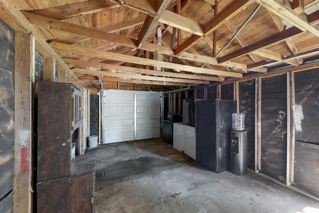 garage with freestanding refrigerator