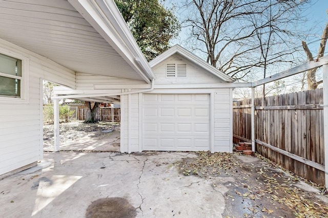 detached garage with fence