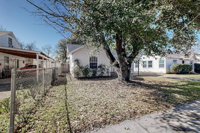 view of front of home with fence