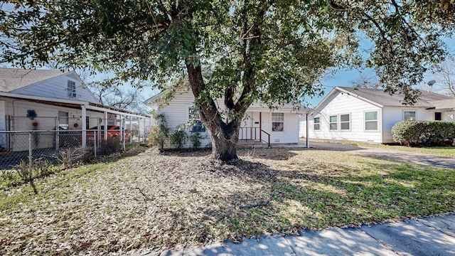 view of front of home with fence