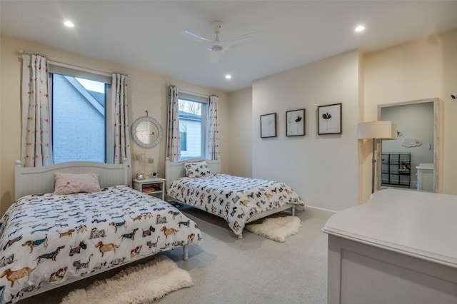 carpeted bedroom featuring baseboards, a ceiling fan, and recessed lighting