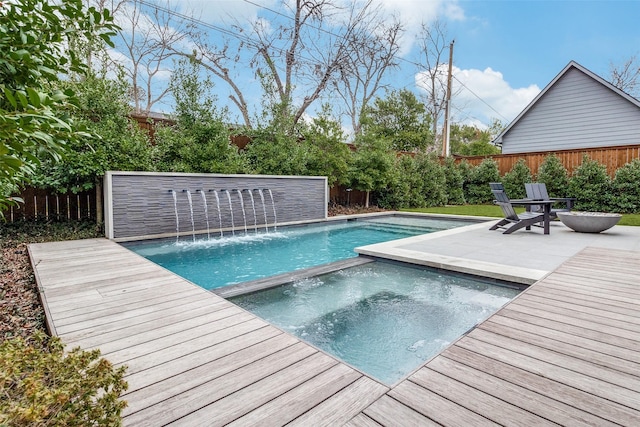 view of pool featuring a patio area, a fenced backyard, and a fenced in pool