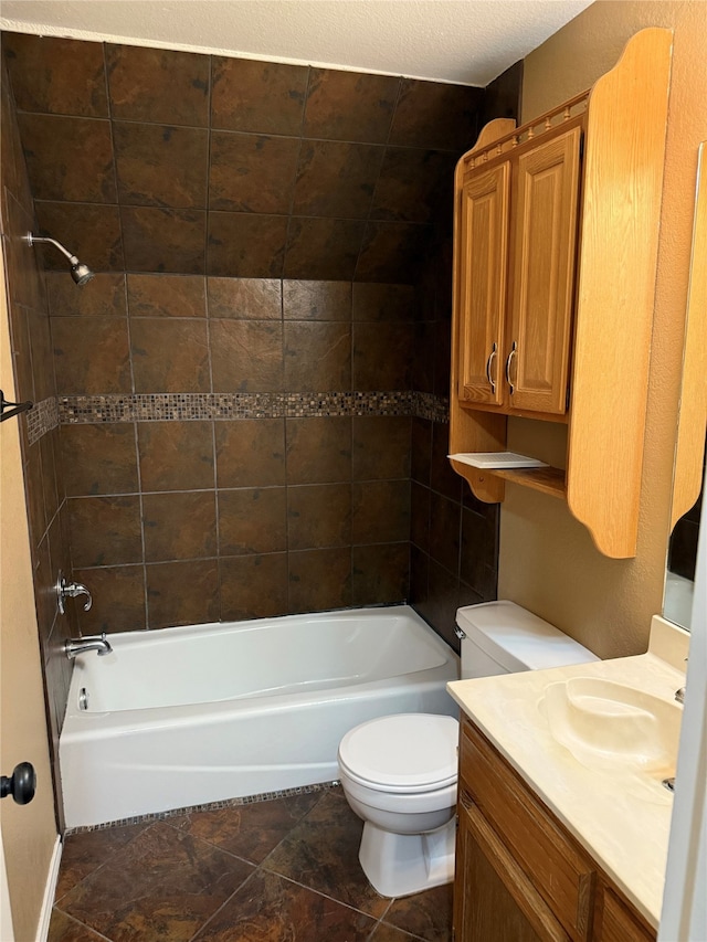 full bath featuring toilet, vanity, and bathing tub / shower combination