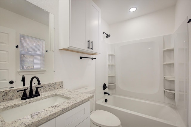 1422 W Austin St, Paris, TX 75460 - full bath featuring recessed lighting, bathtub / shower combination, vanity, and toilet