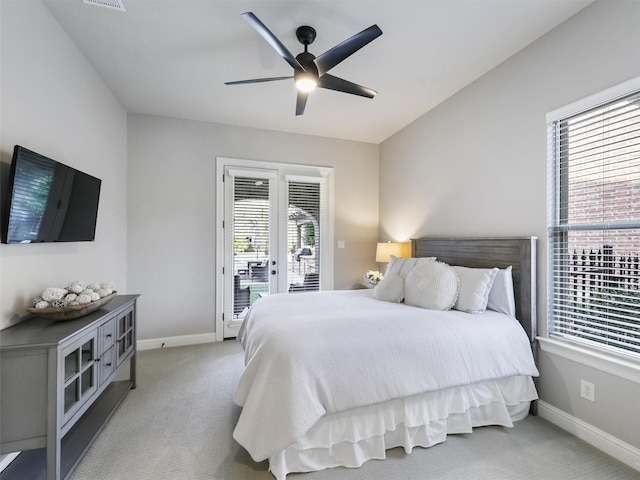 bedroom featuring access to exterior, ceiling fan, baseboards, and light colored carpet