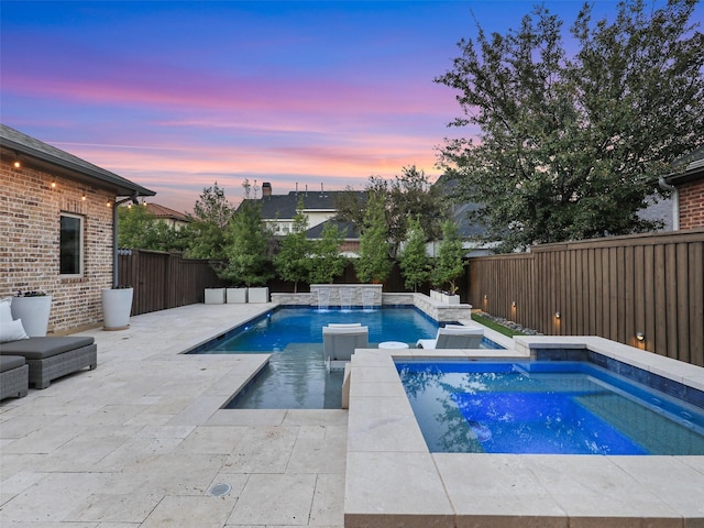 view of pool with a patio area, a fenced backyard, and a fenced in pool