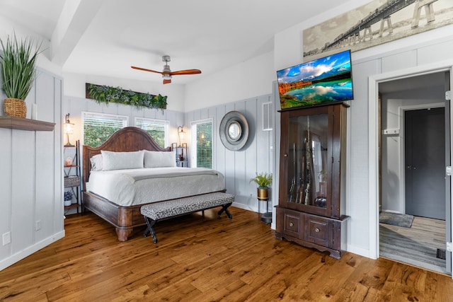 bedroom featuring ceiling fan and hardwood / wood-style flooring