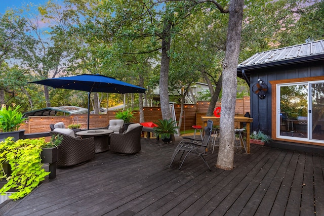 wooden deck with outdoor dining area