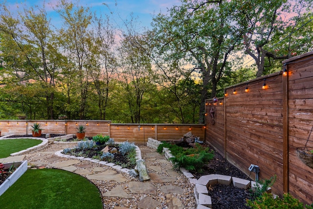 view of yard featuring a fenced backyard