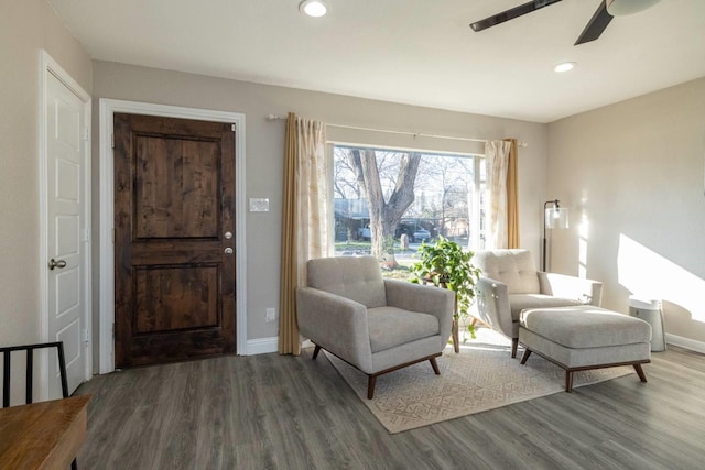 living area featuring ceiling fan, baseboards, wood finished floors, and recessed lighting