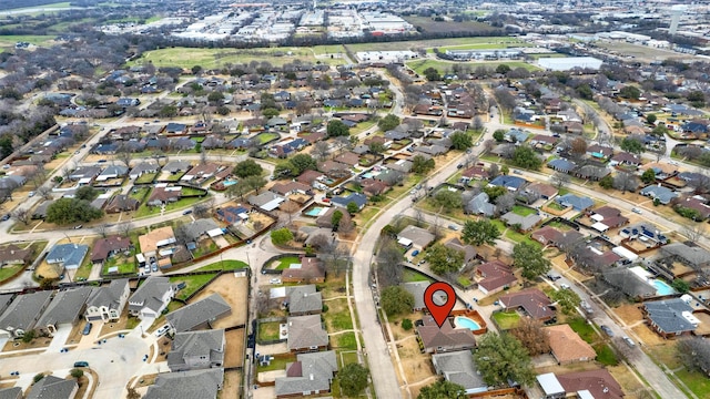 birds eye view of property with a residential view