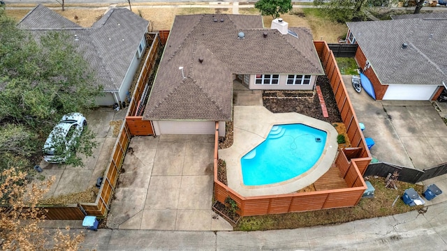 view of swimming pool featuring a fenced backyard