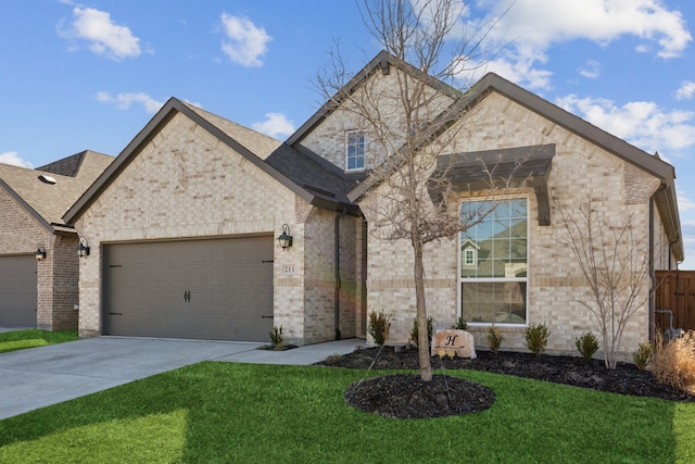 view of front facade with a garage, a shingled roof, concrete driveway, a front lawn, and brick siding