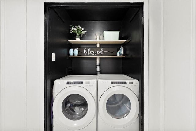 laundry room with washer and clothes dryer