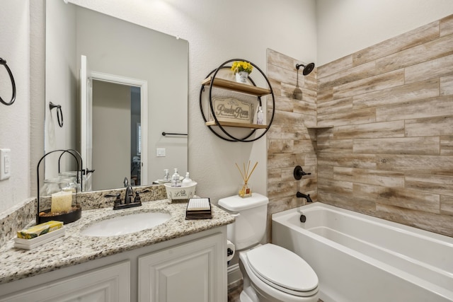 full bathroom featuring  shower combination, vanity, and toilet