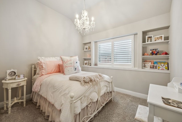 carpeted bedroom featuring a chandelier, lofted ceiling, and baseboards