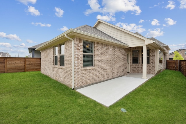 2013 Forest Wood, Mesquite, TX 75181 - rear view of house with a patio area, a shingled roof, and brick siding
