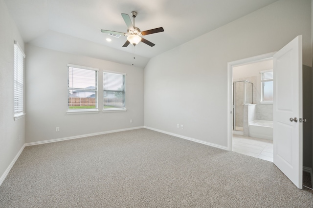 2013 Forest Wood, Mesquite, TX 75181 - unfurnished bedroom with light carpet, baseboards, ensuite bath, a ceiling fan, and vaulted ceiling