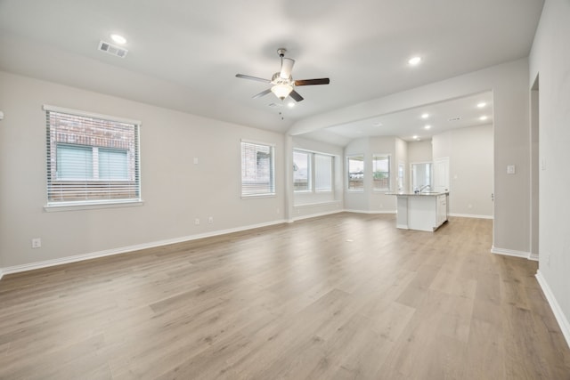 2013 Forest Wood, Mesquite, TX 75181 - unfurnished living room with a ceiling fan, light wood finished floors, baseboards, and recessed lighting