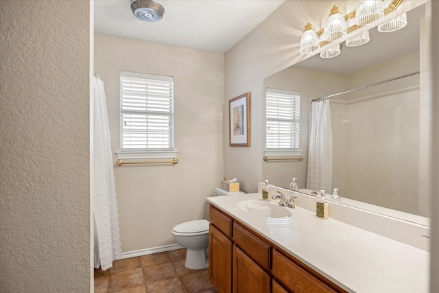 full bathroom with a shower with shower curtain, vanity, toilet, and baseboards