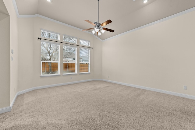 unfurnished room featuring baseboards, a ceiling fan, light colored carpet, and ornamental molding