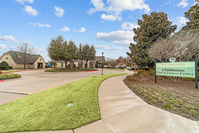 view of road featuring sidewalks and a residential view