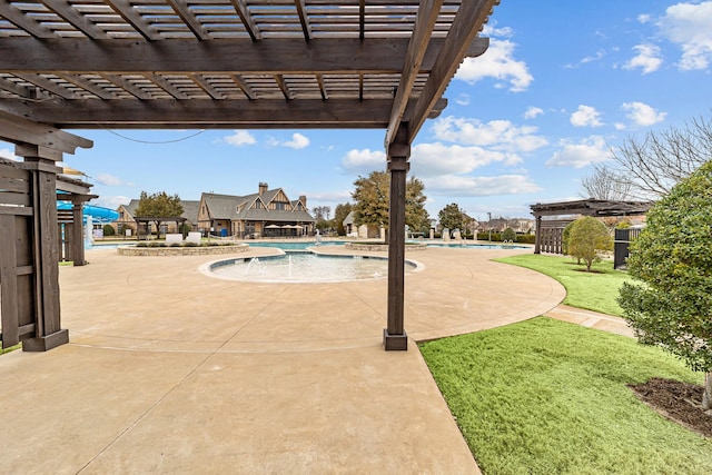 community pool featuring a yard, a pergola, and a patio