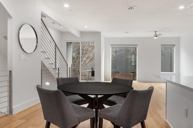 dining room featuring recessed lighting, visible vents, and light wood finished floors