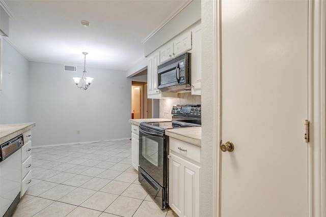 kitchen featuring visible vents, light countertops, backsplash, black appliances, and crown molding