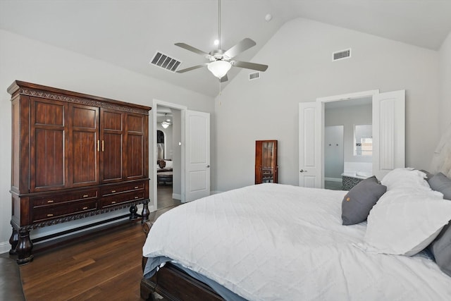 bedroom featuring visible vents, dark wood-style flooring, and connected bathroom