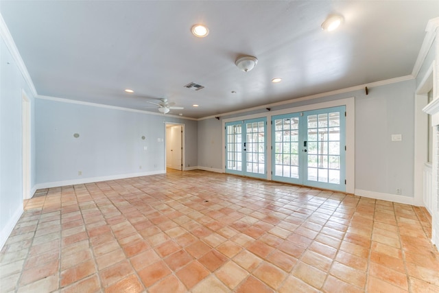 empty room with ornamental molding, french doors, and visible vents